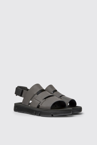 Front view of Oruga Brown leather and textile sandals for men