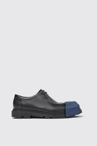 Junction Chaussures en cuir noir pour homme.