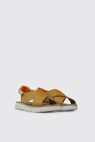 Front view of Oruga Brown and green sandals for women