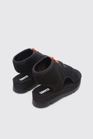 Back view of Oruga Up Black Sandals for Women