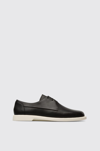 Side view of Juddie Women’s black lace-up shoe
