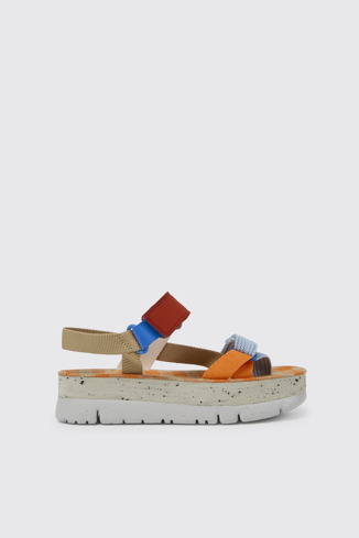 Side view of Oruga Up Beige, blue, and red sandals for women