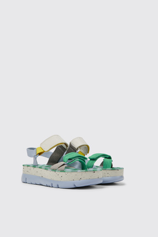 Front view of Oruga Up Blue, green, and grey sandals for women