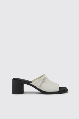 Side view of Meda White and black leather sandals for women