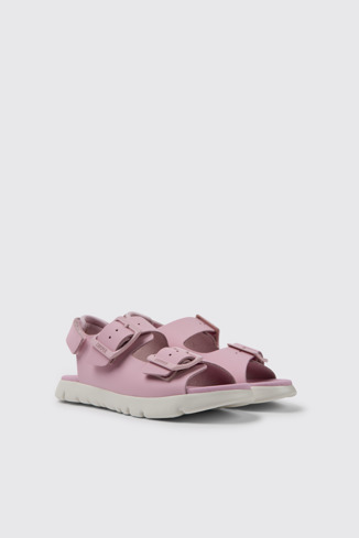 Front view of Oruga Pink leather sandals for kids