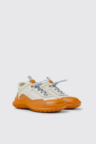 Front view of CRCLR White and orange sneakers for kids