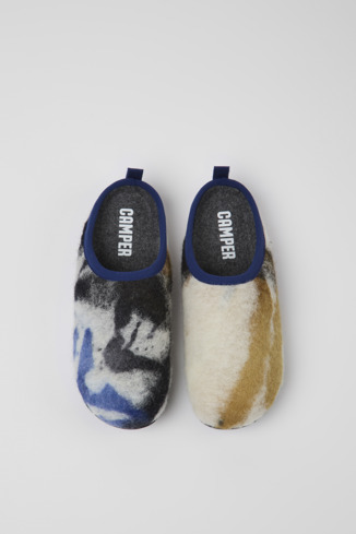 Overhead view of Wabi Blue, black, and white recycled wool slippers for women