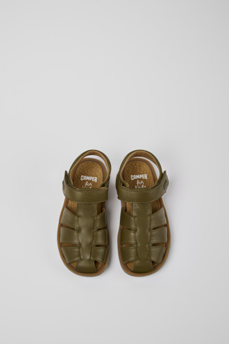 Overhead view of Bicho Green leather sandals for kids