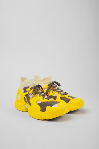 Front view of Tossu Yellow caged sneakers