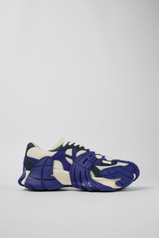 Side view of Tormenta Blue and white sneakers