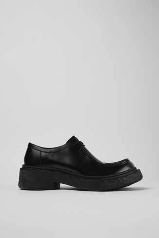 Side view of Vamonos Black Leather Wallabee Shoe