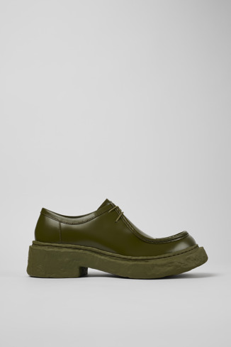 Side view of Vamonos Green Leather Wallabee Shoe
