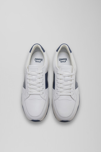 Overhead view of Spackler White and navy leather golf sneakers