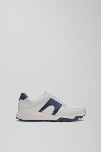 Side view of Spackler White and navy leather golf sneakers