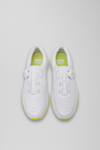 Overhead view of Looper White and light green leather golf sneakers