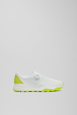 Side view of Looper White and light green leather golf sneakers