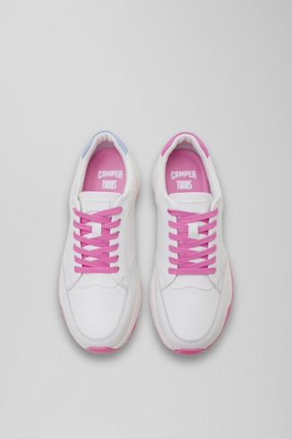 Overhead view of Spackler White and pink leather golf sneakers