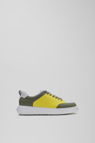 Side view of Birdie Yellow and khaki leather golf sneakers