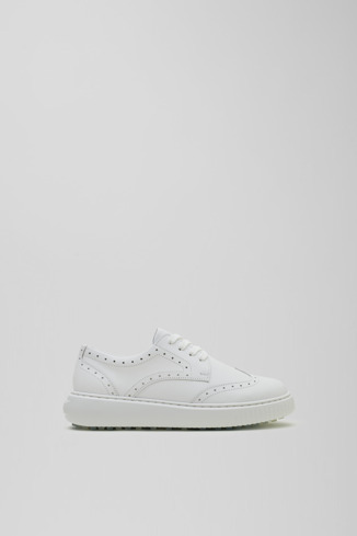 Side view of Birdie White  leather golf sneakers