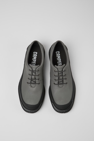 Overhead view of Pix Gray and black leather lace-up shoes for men