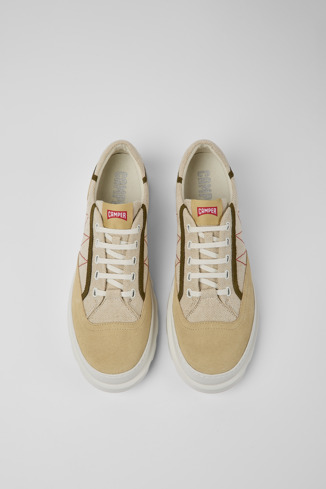 Overhead view of Brutus Beige and green sneakers for men