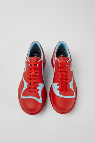 Overhead view of Twins Red and turquoise leather lace-up sneakers