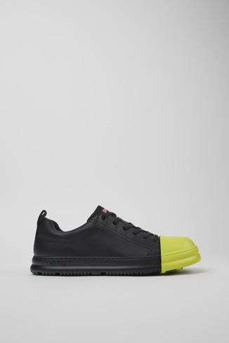 Side view of Junction Runner Black leather sneakers
