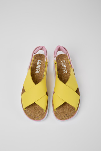 Overhead view of Oruga Yellow and pink sandals for women