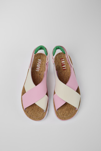 Overhead view of Twins Pink, white, and green sandals for women