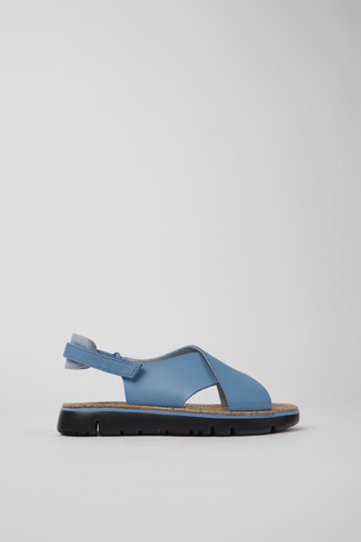 Side view of Oruga Blue leather and textile sandals for women
