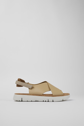 Side view of Oruga Beige Leather/Textile Sandal for Women