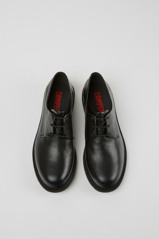 Overhead view of Neuman Black leather lace-up shoes
