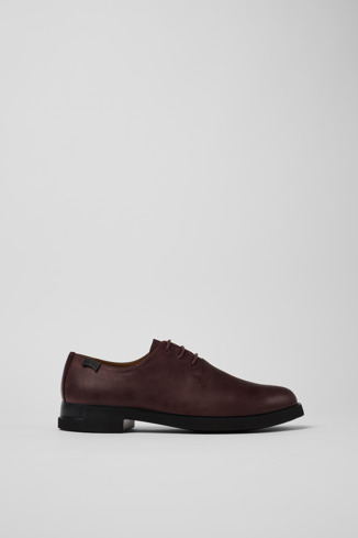 Side view of Iman Women’s burgundy lace-up shoe