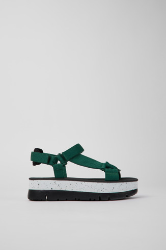 Side view of Oruga Up Green textile sandals for women