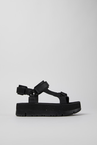 Side view of Oruga Up Black leather sandals for women
