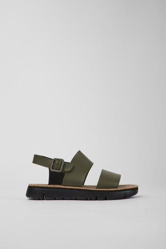 Side view of Oruga Green leather sandals for women