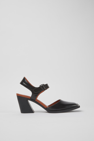 Side view of Karole Black leather semi-open shoes