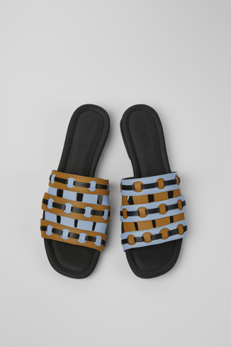 Overhead view of Twins Brown, blue, and black leather sandals for women