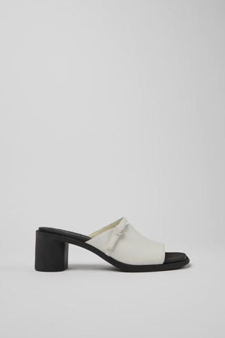Side view of Meda White and black leather sandals for women