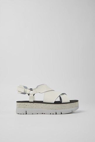Side view of Oruga Up White leather sandals for women