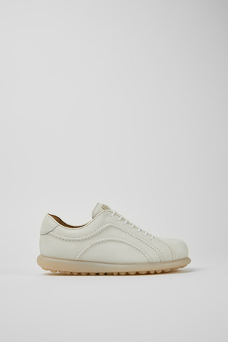 Side view of Pelotas White non-dyed leather sneakers for women