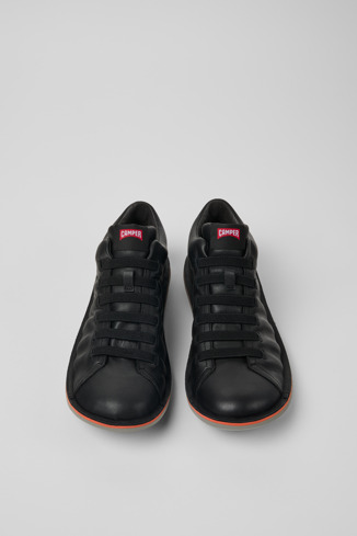 Overhead view of Beetle Black leather sneakers