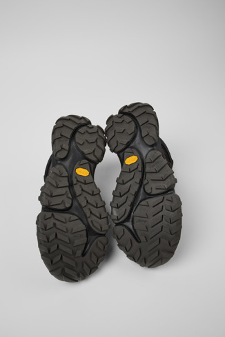 The soles of Karst Trek Multicolor Textile and Nubuk Ankle Boots for Men.