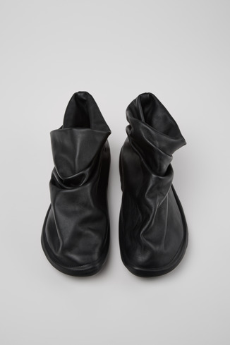 Overhead view of Camper x ISSEY MIYAKE - Peu Form Black Leather Ankle Boots for Men.