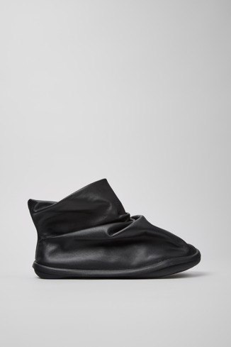 Side view of Camper x ISSEY MIYAKE - Peu Form Black Leather Ankle Boots for Men.