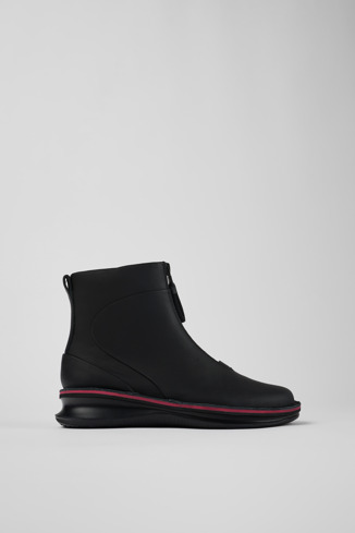 Side view of Rolling Black Boots for Women
