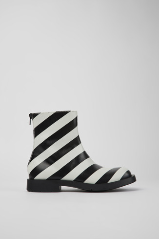 Side view of MIL 1978 Black and white leather ankle boots for women