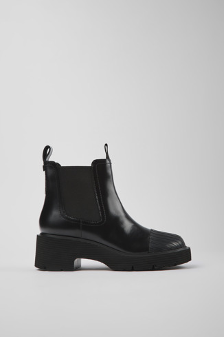 Side view of Milah Black leather Chelsea boots for women