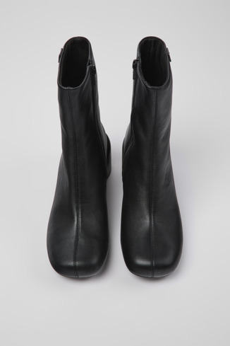 Overhead view of Niki Black leather boots for women