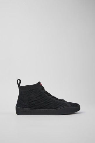 Side view of Peu Touring Black one-piece knit sneakers for women